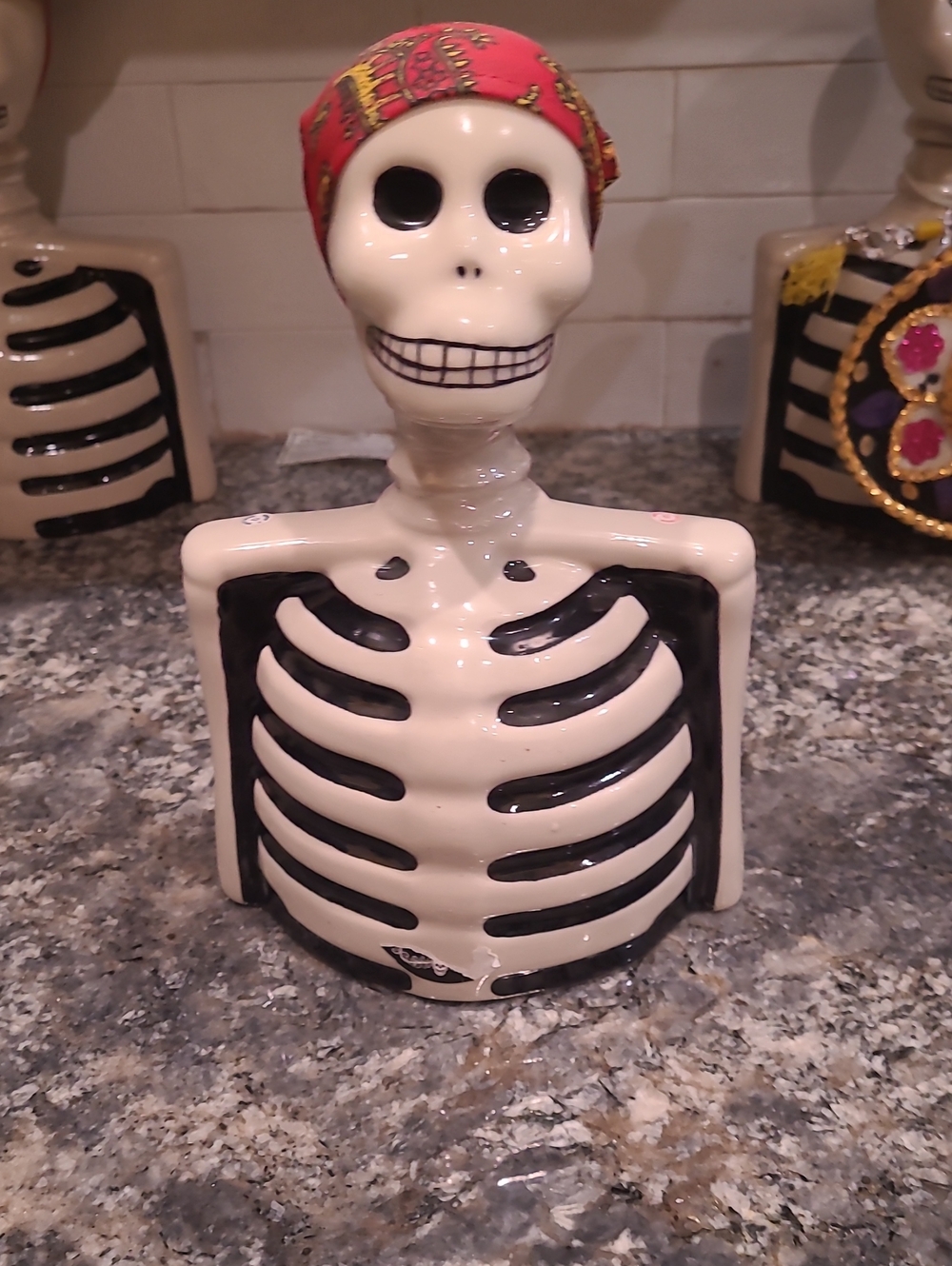 Ceramic Skeleton Bust Décor in White and Black with Straw Hat Accent